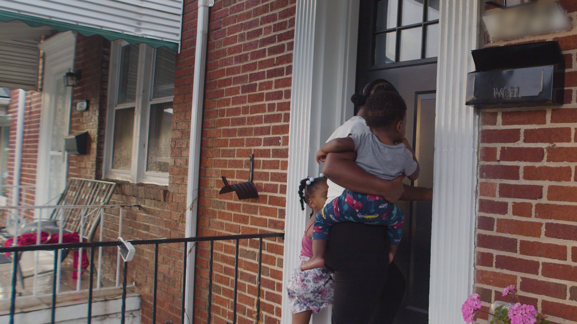 A family arriving home